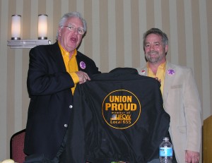UNION PROUD: UFCW International President Joe Hansen (left) accepts a windbreaker with the new “UNION PROUD member of Local 655” logo on it from Local 655 President David Cook. Hansen was keynote speaker at last week’s annual Shop Stewards’ Educational Conference held at the 100 percent union Sheraton Clayton Plaza Hotel. He gave a stinging rebuke to Missouri Republican lawmakers trying to destroy working families. – Labor Tribune photo