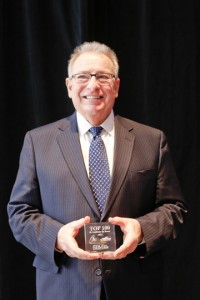 HONORED: Jim LaMantia, PRIDE’s executive director, received a commemorative memento from St. Louis Small Business Monthly honoring his being named as “100 St. Louisans To Know to Succeed in Business.” – St. Louis Small Business Monthly photo