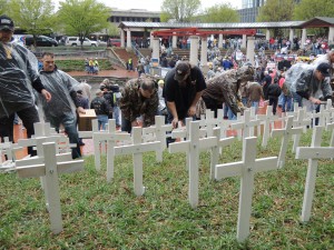 REMEMBERING THE FALLEN and those at risk, the United Mine Workers of America, rallying in St. Louis April 16, planted 1,000 crosses in the grass at Keiner Plaza to represent miners killed at Peabody, Arch and Patriot mines and those currently at risk due to the threatened cut-off of health care benefits. – Labor Tribune photo