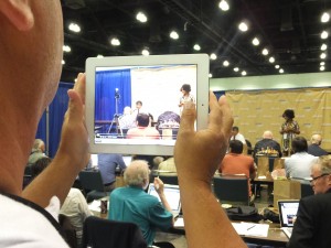 Los Angeles – GETTING THE PHOTO on an I-Pad of AFL-CIO President Richard Trumka (seated at table in front) talking to reporters at a pre-AFL-CIO Convention press conference at the Los Angeles Convention Center where almost 1,000 delegates and visitors will be debating an historic shift in the labor federation’s direction. Labor Tribune photo