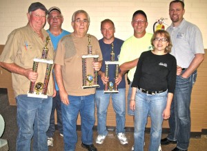 TAKING AIM FOR UNITED WAY: Winners of the 6th annual Labor/United Way Trap Shoot were (front row, from left) Second place finisher Jim Alexander (Operating Engineers 520),Third Place finisher Bill Lawrence (Machinists Lodge 660) and First Place winner Steve Miller (Machinists Lodge 660). Congratulating the winners are (from right to left) United Way staffers, Senir Vice President, Resource Development R.J. Crunk and Labor Liaison Roz Sherman-Voellinger; Madison Conty Federation of Labor President B. Dean Webb and (back row, second from left) Southwestern Illinois Central Labor Council President Bill Thurston. Labor Tribune photo 