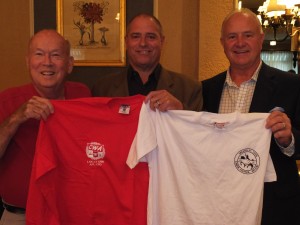 A REMEMBERANCE of the support George Roman, vice president, State and Local Government Operations for the Boeing Company nationwide (center), gave to promoting positive labor-management relationships, union-made, American-made T-shirts were presented by St. Louis Labor Council President Bob Soutier (right) and council Vice President John Ebeling.  – Labor Tribune photo 