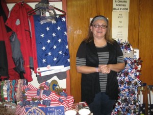 MADE IN AMERICA: Kim Roth, co-author of Take Back America: 20 Simple Ways the Average American Can Help, displays some of the American-made products she says purchasing can help create jobs. – Labor Tribune photo 