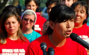 WOMEN’S VOICES: Ai-jen Poo, director of the National Domestic Workers Alliance, speaks at a rally urging fair immigration reform for laborers.  –womentogether photo 