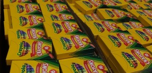 Hundreds of boxes of Crayons waiting to be packed for students.