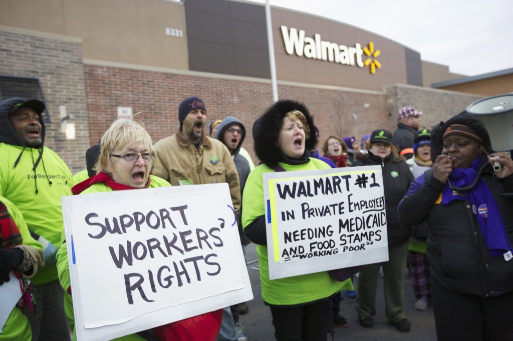 ALWAYS LOW WAGES, ALWAYS: Walmart workers fighting to get the retail giant to publicly commit to raising wages and increasing access to full-time hours. – Reuters/John Gress photo 