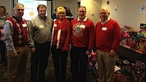 UNION ELVES: Bringing joy brought to sick children hospitalized during 2013 Christmas season were (from left,) Missouri AFL-CIO President Mike Louis, Teamsters 688 Secretary-Treasurer Mike Goebel, UFCW Local 655 Director of Organizing/Political Affairs Merri Berry, Teamsters Joint Council 13 President Marvin Kropp (secretary-treasurer of Local 618) and retired Teamster and State Representative Bob Burns (D-Affton).