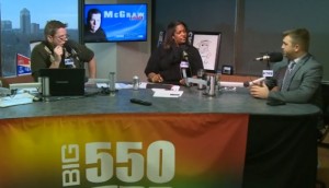 ON THE AIR: St. Louis County Police Officers Association President Gabe Crocker (right) condemns Rams player’s ‘hands up, don’t shoot’ gesture while being interviewed recently by KTRS radio host McGraw Milhaven (left) and co-host Kelly Jackson during their weekday morning show.   – KTRS screencap