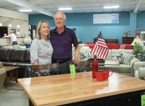 FOCUS ON U.S. PRODUCTS: Paula and Nick Scalfano, owners of Furniture Marketplace, have made American-made products the cornerstone of the business. – Labor Tribune photo
