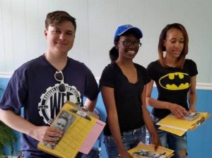PROMOTING DEMOCRACY VIA VOTING are volunteers for the Workers Education Society who are part of a door-to-door registration and voter education campaign in four St. Louis city wards. (From left) Niles Zee, Nijahnae Davis and Margarette McAllister. - WES photo