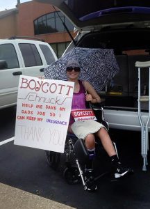 FIGHTING RARE BONE CANCER that’s taken a major part of her femur and her knee and about to lose the protection of her father’s health insurance with Schnucks, 17-year-old Kinsey Siadek joins her dad on the Teamsters Local 688 “Boycott Schnucks” picket line, bravely fighting the weather with the same strength she is showing in fighting her cancer, which is now in remission. Dad is 21-year Schnuck warehouse teamster Adam Siadek.