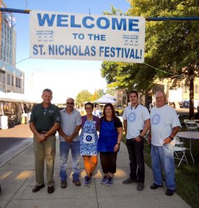 THANKING IBEW LOCAL 1 Business Representative Dave Roth (from left) and Sachs Electric electrician Alan Twillman for their help with St. Nicholas Greek Orthodox Churche’s recent Greek Festival were festival executive committee members Christina Ginos, Carol Kamburis and volunteers Jonathan Hartly and Bill Dubis. – Labor Tribune photo