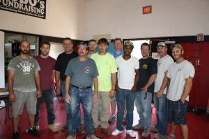 APPRENTICES AND UNION REPRESENTATIVES with Tile, Marble and Terrazzo Workers Local 18 take a break after wrapping up flooring projects at St. Rose Phillipine Duchesne Catholic School in Florissant. (From left are) Apprentice Stan Mihaylov, Luke Spain, Apprentice Instructor Stoyan Hristov, Apprentices Michael Aubuchon and Greg Keeney, Local 18 President Mike Weber, Athletic Association President Kevin Carpentier, and Apprentices Marcus Curry, Scott Mills, Sam Kamphoeufner and Kody Tierney. – Labor Tribune photoAPPRENTICES AND UNION REPRESENTATIVES with Tile, Marble and Terrazzo Workers Local 18 take a break after wrapping up flooring projects at St. Rose Phillipine Duchesne Catholic School in Florissant. (From left are) Apprentice Stan Mihaylov, Luke Spain, Apprentice Instructor Stoyan Hristov, Apprentices Michael Aubuchon and Greg Keeney, Local 18 President Mike Weber, Athletic Association President Kevin Carpentier, and Apprentices Marcus Curry, Scott Mills, Sam Kamphoeufner and Kody Tierney. – Labor Tribune photo